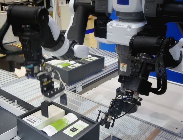 A robot working on an assembly line uses force to move objects around. This is an example of a force that is applied by a simple machine.